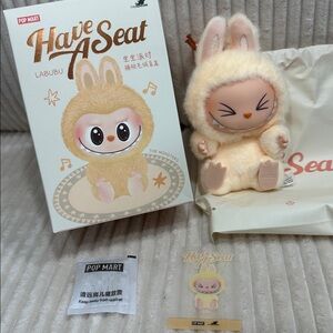 SISI - Pop Mart - Have A Seat-Labubu Plush Toy with pouch. Box opened to verify.